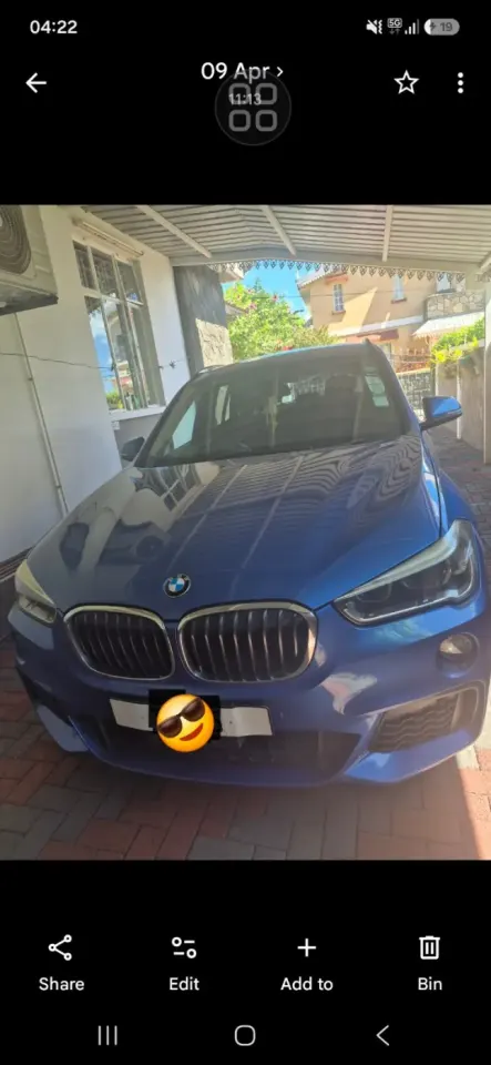 Blue BMW X1 SUV