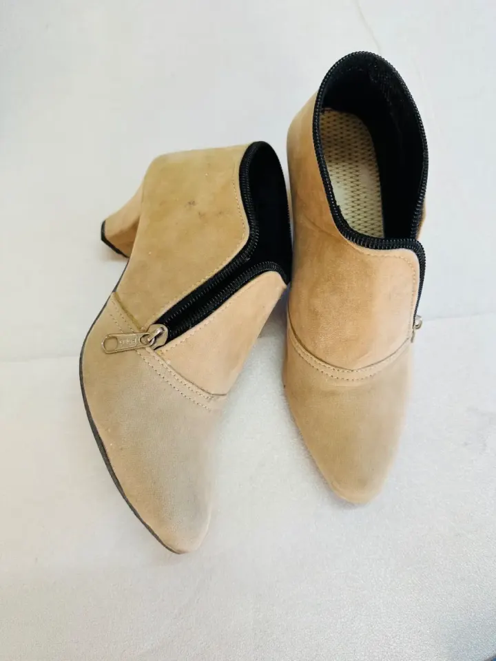 Bottes cheville beige stylé avek zip lor kote