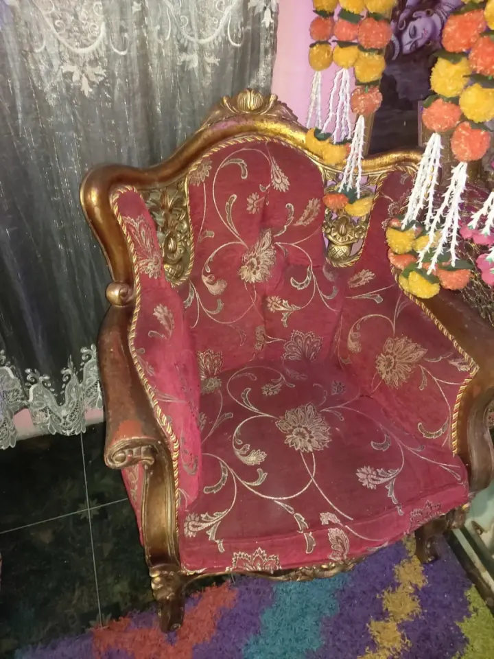 Ornate Red Armchair with Gold Accents