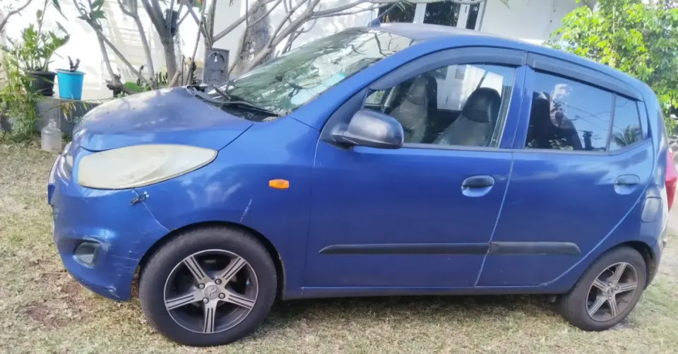 Blue Hatchback Car