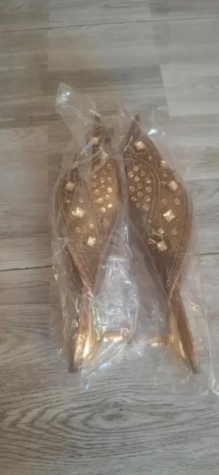 Gold high heels with pearls