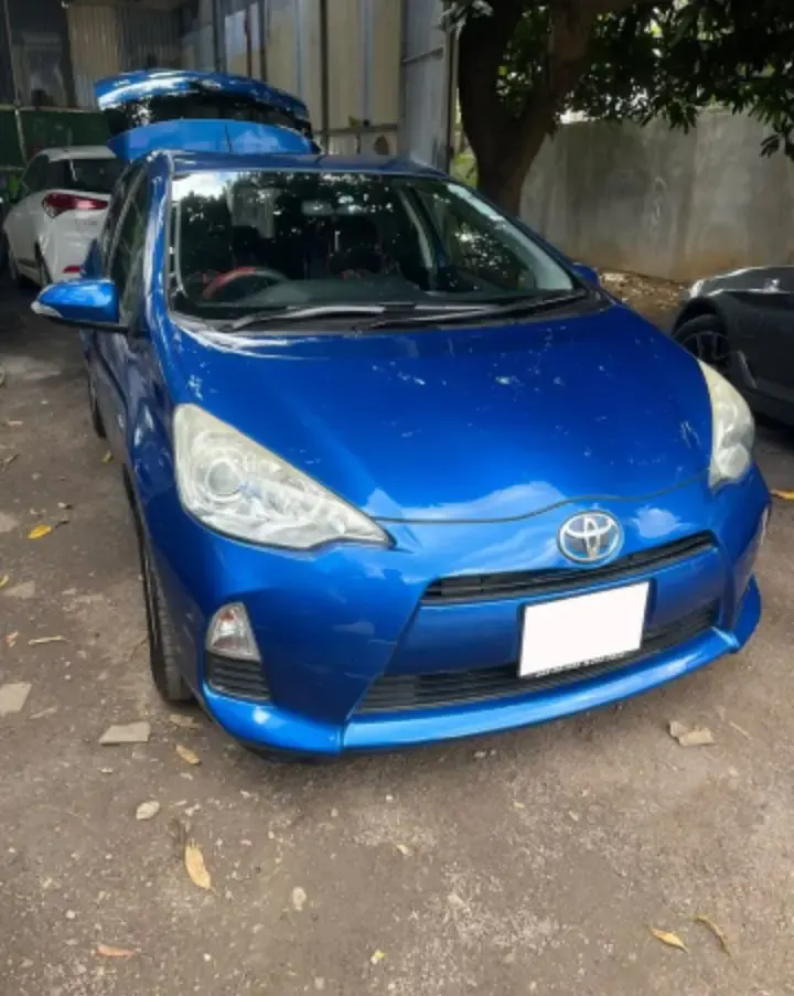 Blue Toyota Aqua Hybrid Car