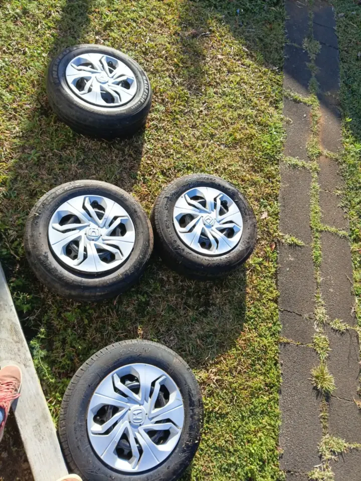 Set of 4 Used Car Wheels with Hubcaps