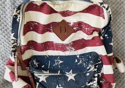 Backpack with American flag design, red, white, and blue colors, casual style, suitable for everyday use.