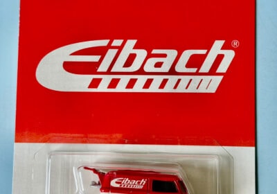 Hot Wheels Abach Kool Kombi die-cast toy van, red and white, collectible model for kids and enthusiasts.