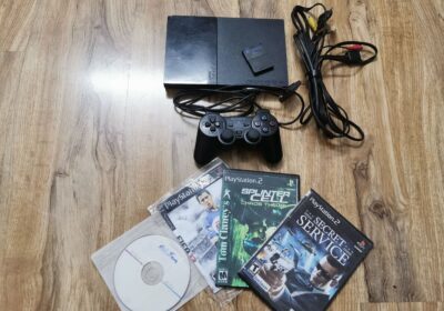 PlayStation 2 Console with Controller and Games