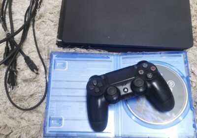 PlayStation 4 Console with Controller and Cables