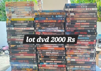 Car DVD player with remote control, black color, compact size, suitable for in-car entertainment.