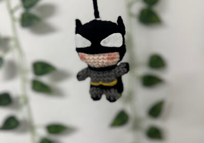 Batman plush keychain, black and gray, soft fabric, cute cartoon character, for bags or keys.