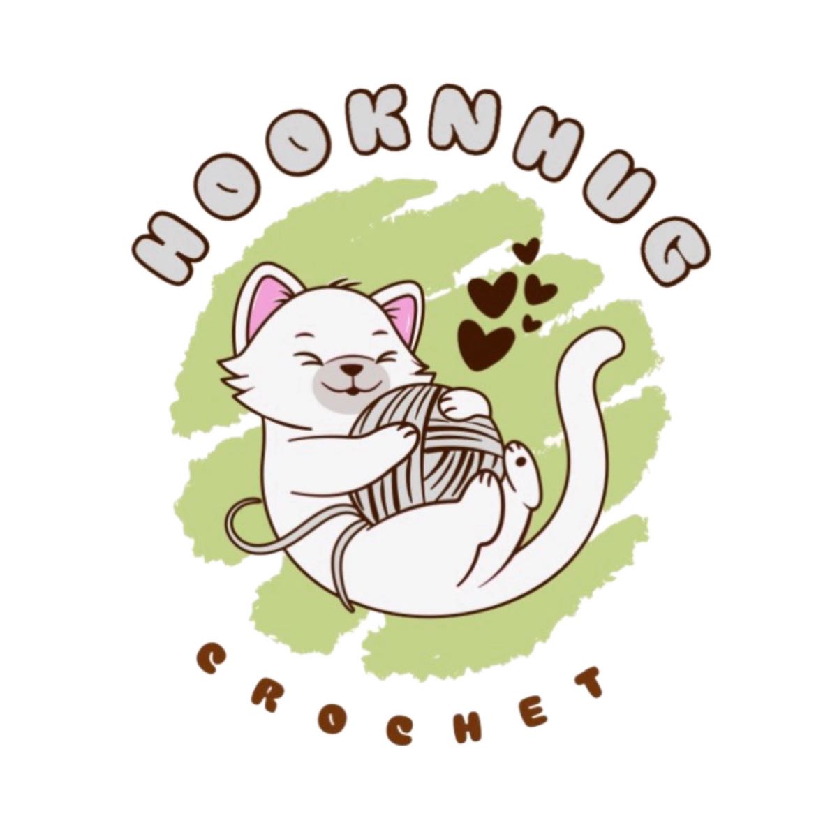 Cute crochet cat holding yarn with hearts.