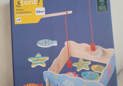 Little Storiz! Magnetic fishing game for children aged 24 months and older, featuring colorful fish and a wooden boat for interactive play.