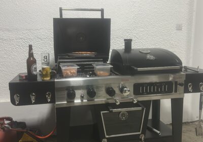 Outdoor BBQ Grill with Accessories and Drinks
