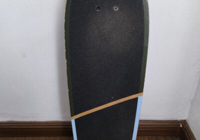 Skateboard with Black Grip Tape and Colorful Edges